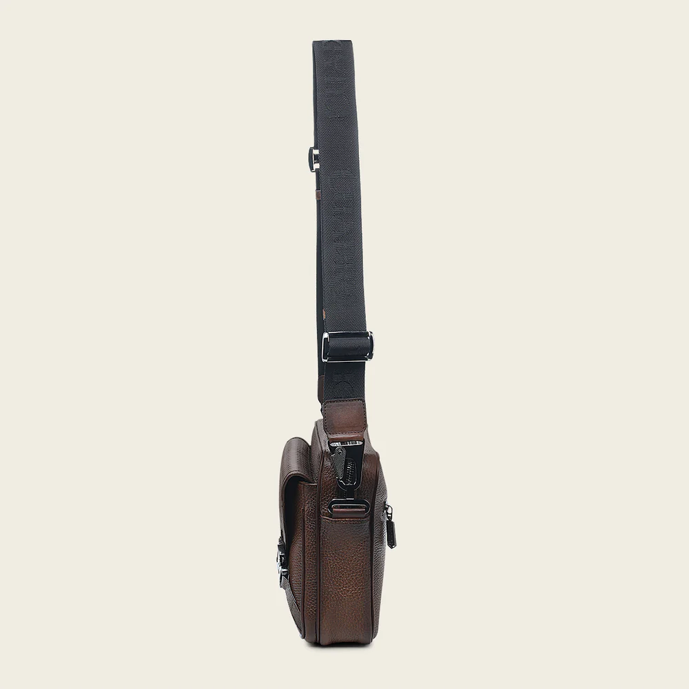Honey brown bovine messenger handbag