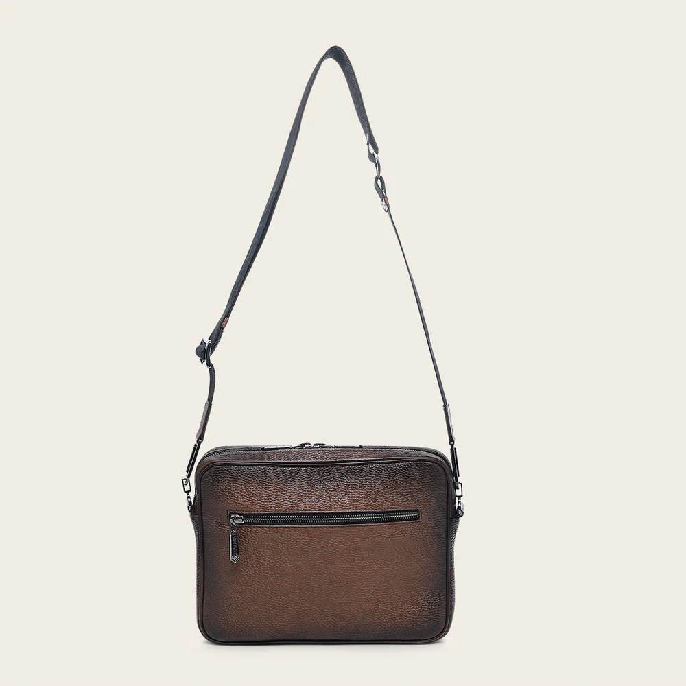 Honey brown bovine messenger handbag