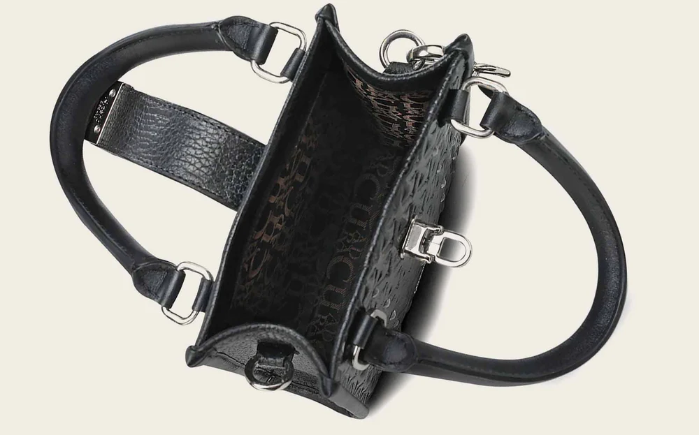 Black stingray geometric top handle handbag